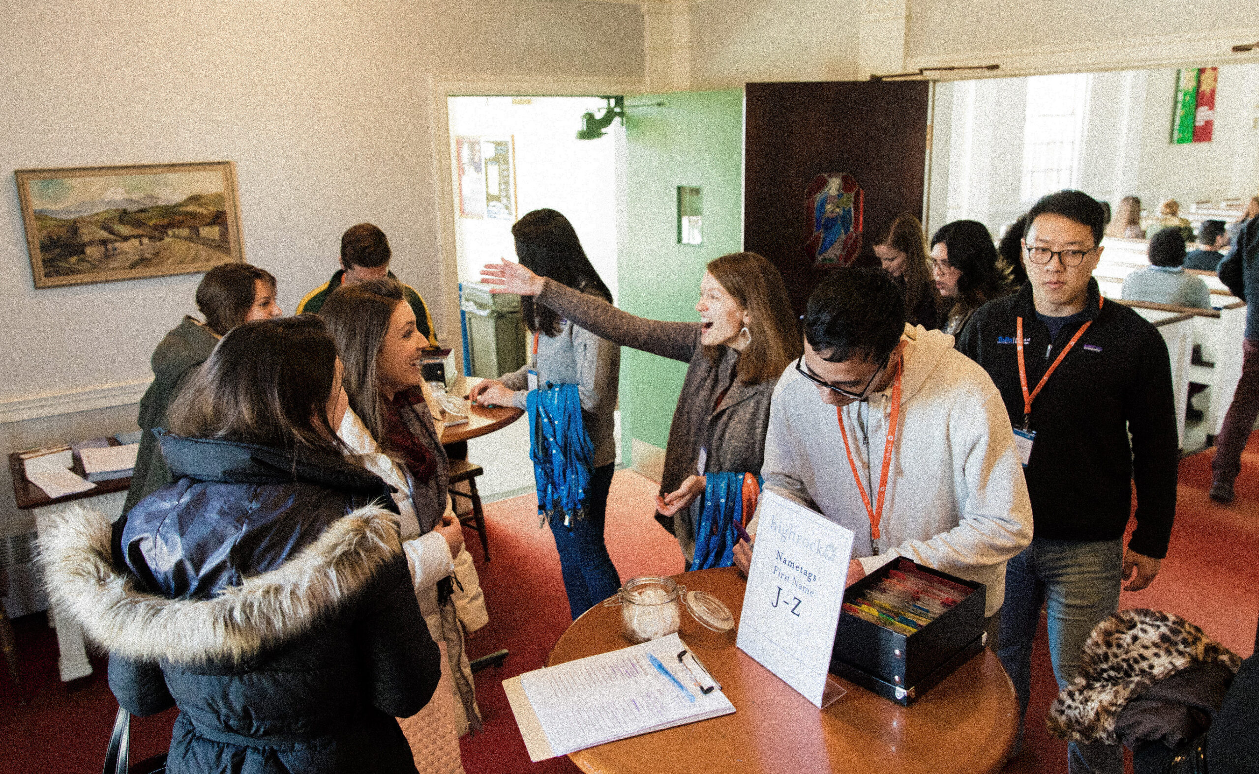 The welcoming team greeting people as they walk into the building for Sunday service