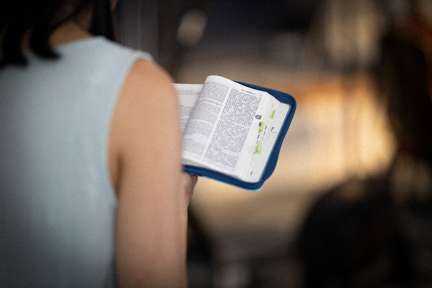 Photo of woman holding a bible at Granite City Church