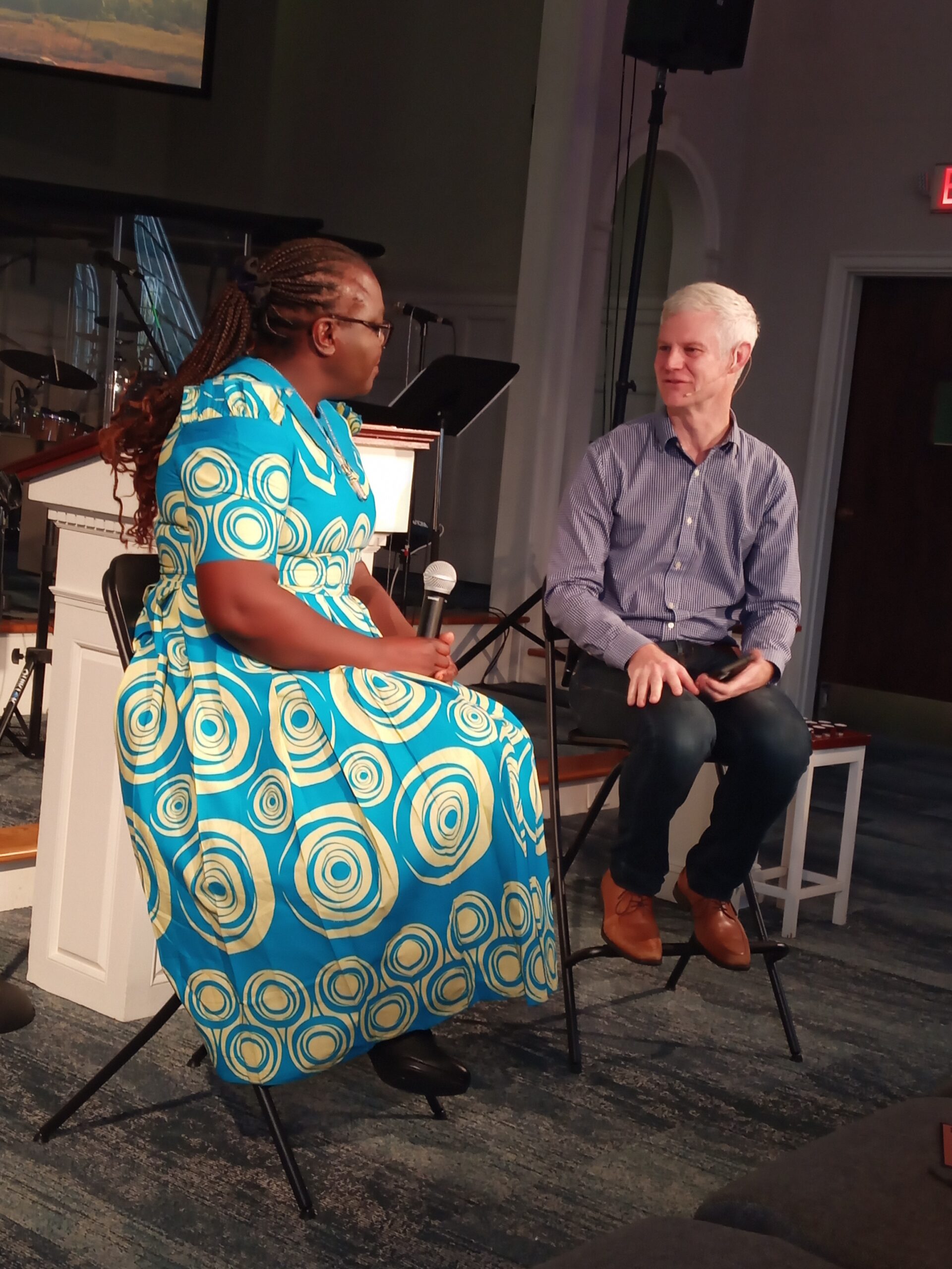 Dr. Audrey Matimelo talks with Pastor Stephen Sharkey at Granite City Church